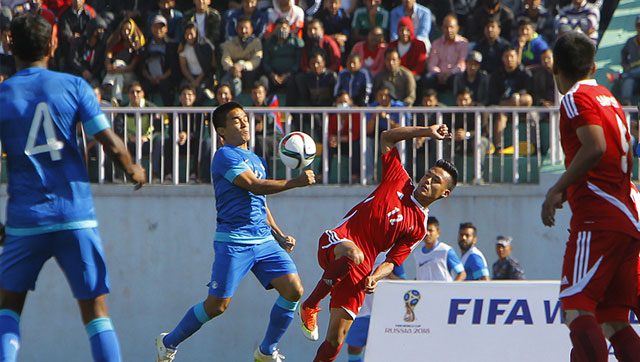 India’s Sunil Chhetri competes for the ball with Nepal’s Bikram Lama during their 2018 Fifa World Cup qualifying match in Kathmandu, Nepal. (AP Photo)