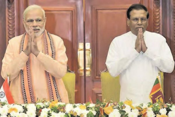 Prime Minister Narendra Modi with Sri Lankan President Maithripala Sirisena during an agreement signing ceremony in Colombo.