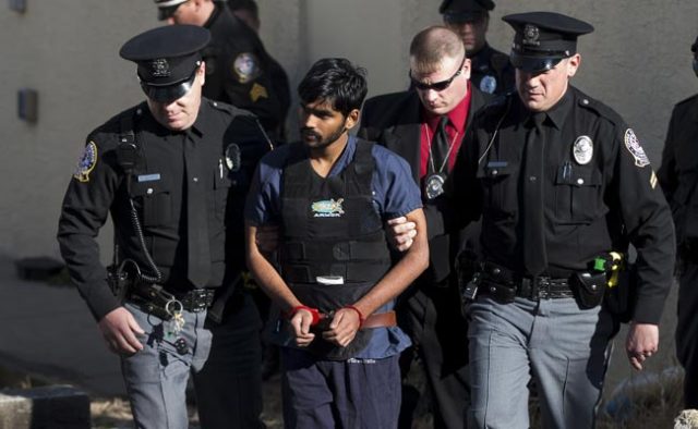 FILE- Raghunandan Yandamuri is escorted from a Montgomery County district court after a preliminary hearing (Associated Press photo)