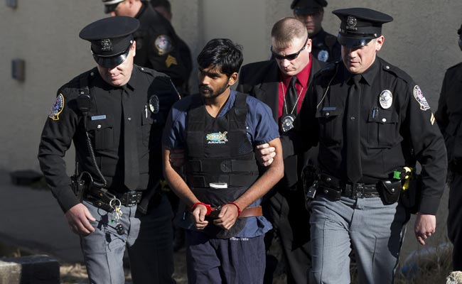 FILE- Raghunandan Yandamuri is escorted from a Montgomery County district court after a preliminary hearing (Associated Press photo)