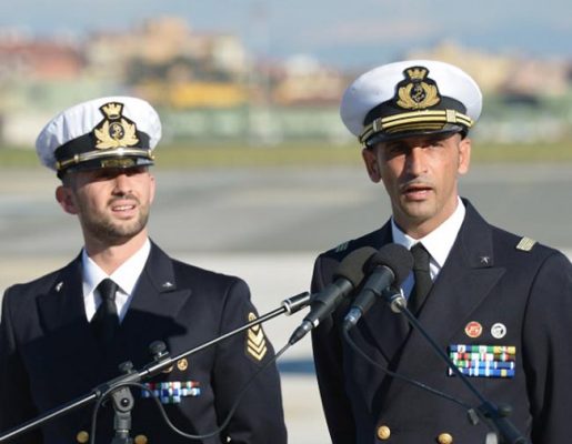 Italian marines Massimiliano Latorre (R) and Salvatore Girone (L) speak to the press at Ciampino airport near Rome, on December 22, 2012. AFP PHOTO/ VINCENZO PINTO