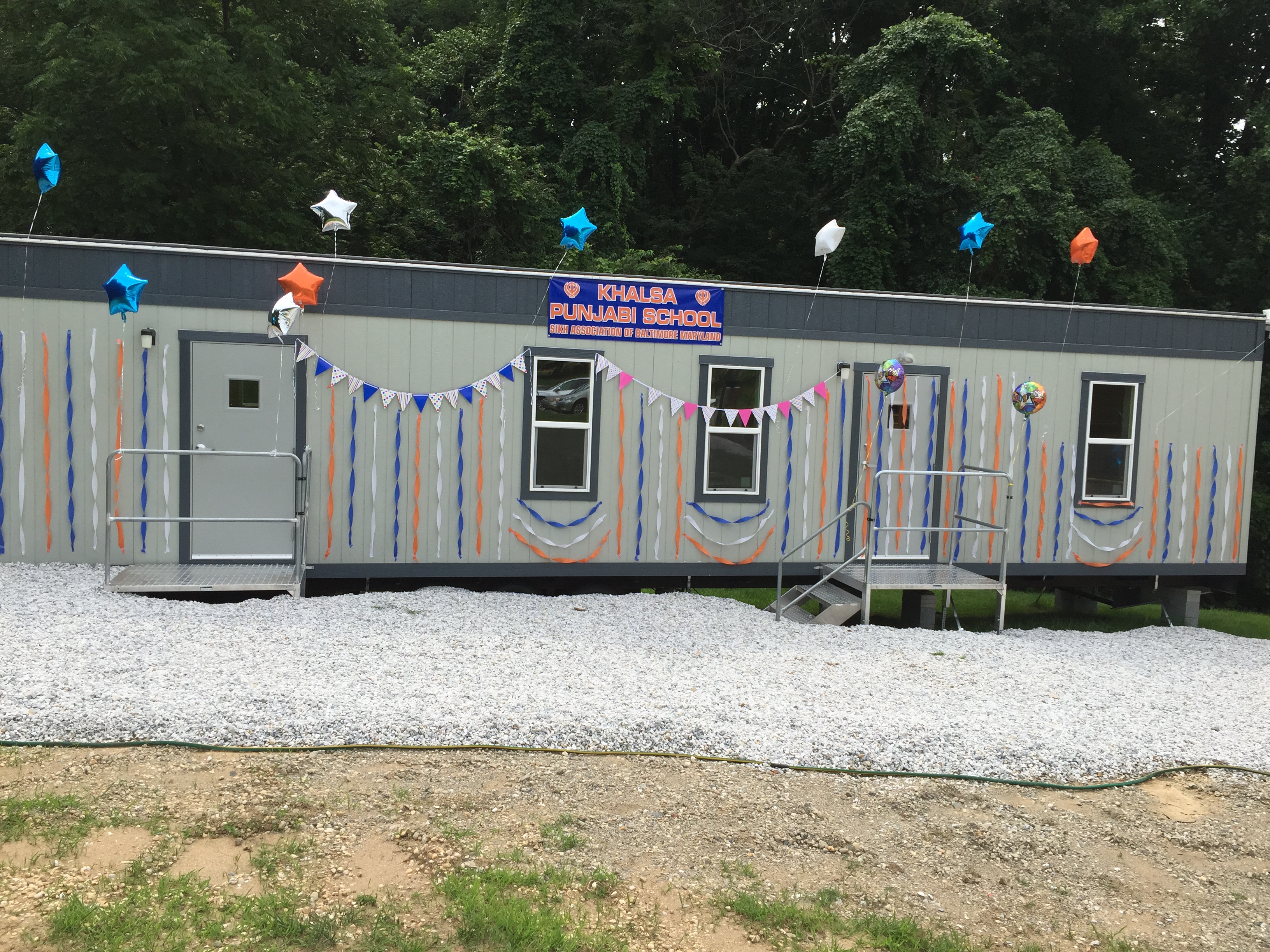 The Trailer which houses the school.