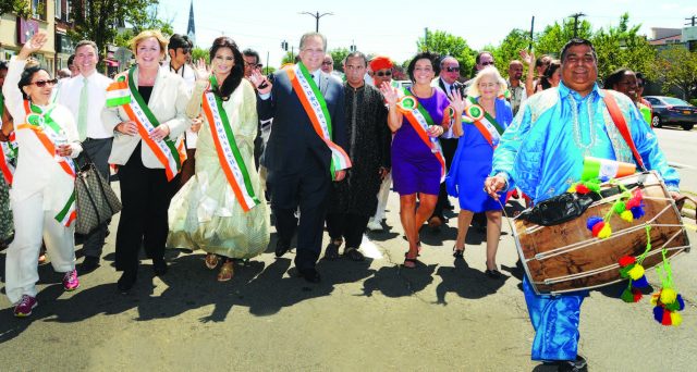 Leading the parade, to the drumbeat. In the front row, from L to R: Indu Jaiswal, Kate Murray, Grand Marshall Neetu Chandra, Ed Mangano, Bobby Kalottee , Linda Mangano, and Judy Bodsworth