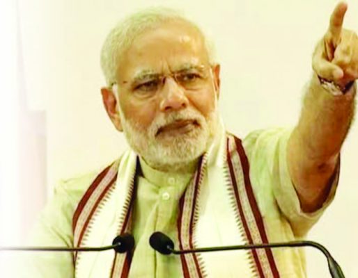 Prime Minister Narendra Modi addressing a gathering at Dubai Cricket Stadium.