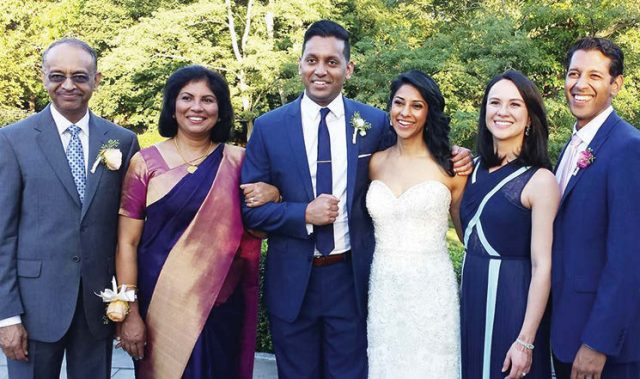 The happy Abraham family. (L to R): George, Lona, Vilas, Suneela, Danielle, and Steven