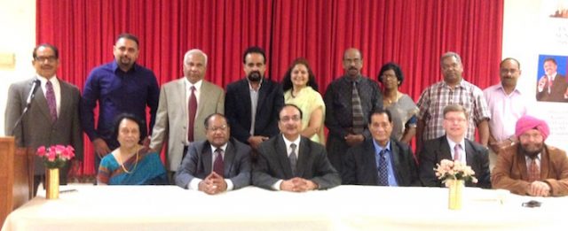 Attached photo: Immigration panelists with organizers. From l. to r. in the front row: Sudha Acharya, Dr. Thomas Abraham, Anand Ahuja, Michael Phulwani, David Nachman and Inderjit Singh