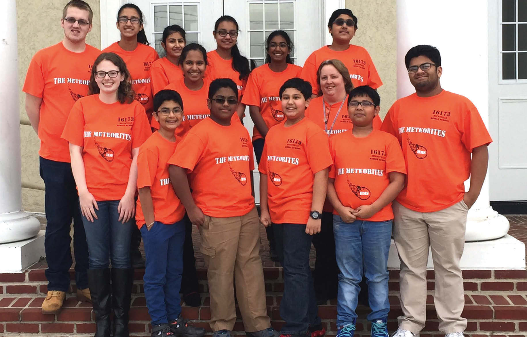 A rookie team, Hicksville Middle School's Meteorites has reached the FIRST LEGO Robotics Competition. Their mentor Shiv Chopra (front row, extreme right) is President of Hicksville High School's robotics program.