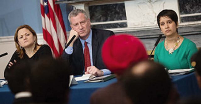 Speaker Melissa Mark-Viverito, Mayor de Blasio and Commissioner for Immigrant Affairs Nisha Agarwal listen to the suggestion of The Indian Panorama editor Prof. Saluja at the Ethnic Media Roundtable at City Hall on February 17. Photo/ William Alatriste for the City Council