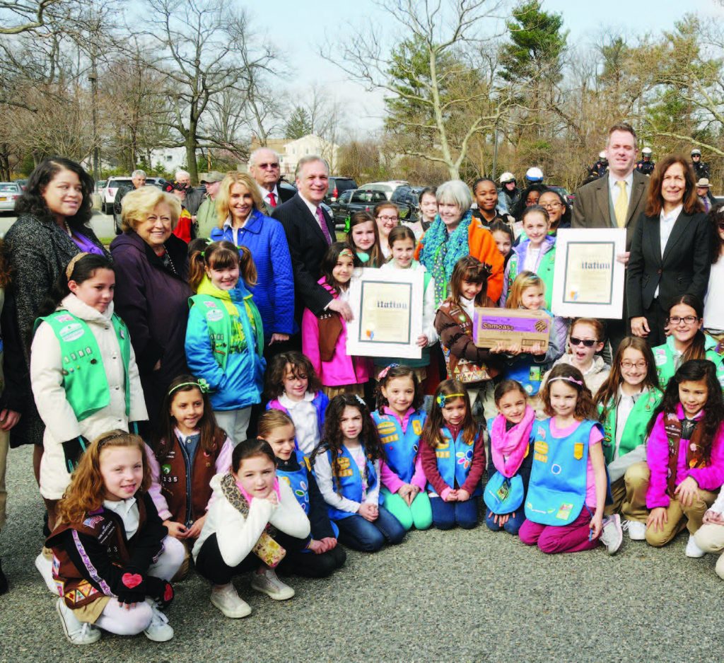 From Left to Right: NYS Assemblywoman Michaelle Solages; Nassau County Legislator Judy Jacobs; Nassau County Legislator Laura Schaefer; Jim Adelis of Adelis International Security; County Executive Edward P. Mangano; Executive Director/CEO of the Girl Scouts of Nassau County, Donna Ceravolo; a representative from DHL Express; Nassau County Legislator Ellen Birnbaum