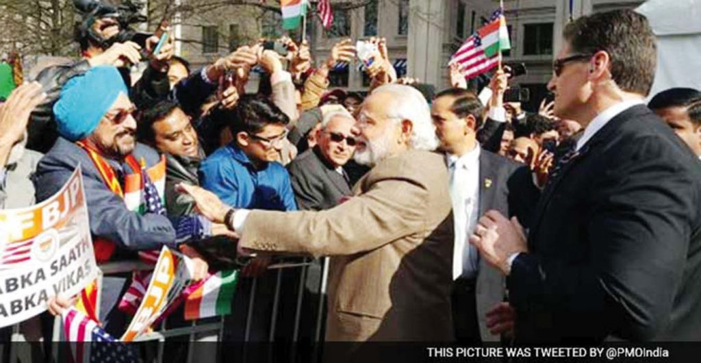 Prime Minister Narendra Modi is greeted by the Indian American community in Washington, March 31