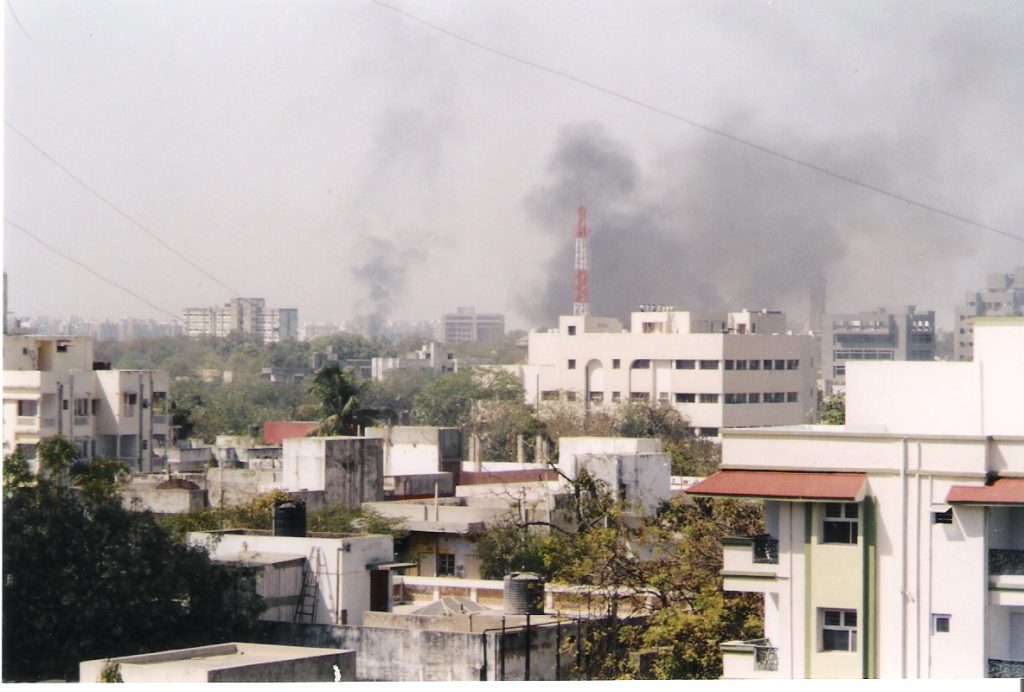 A mob stormed Gulbarg Society residential complex in Ahmedabad in 2002 and targeted Muslims during riots that swept state then led by Narendra Modi. The skyline of Ahmedabad filled with smoke as buildings and shops are set on fire by rioting mobs
