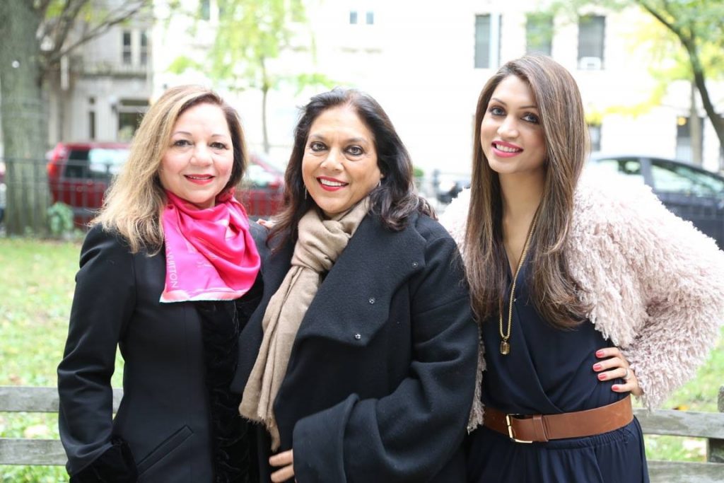 Dr Rashmee Sharma (left) and Co-owner of Roshni Media Group Mani Kamboj pose with Mira Nair