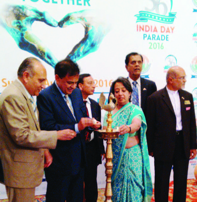 Ambassador Riva Ganguly Das and FIA officials light the lamp to kick off the 36th India Day Parade, scheduled for August 21