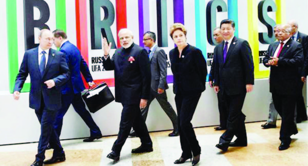 India's Prime Minister Narendra Modi is hosting leaders of the world's most populous and powerful emerging economies over the weekend. They would be looking for ways to bolster their club and ease tensions among them.Picture shows BRICS leaders at the summit in Ufa, Russia