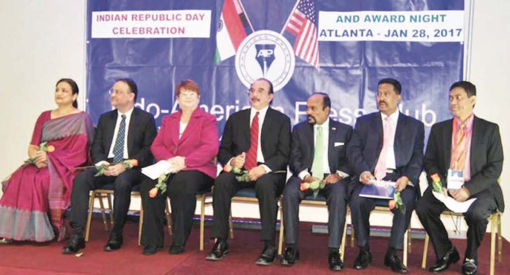 On the dais are seen Chief Guest Nagesh Singh, Consul General of India in Atlanta (second from left), Guest of Honor Charlotte Nash, chair of Commissioners of Gwinnet County (third from left), other dignitaries and IAPC office-bearers