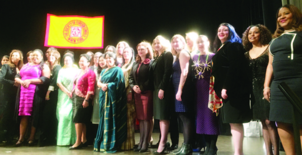 SOFC President Maria Isabel Nieto and India's Consul General Riva Ganguly Das join the honorees for a photography session