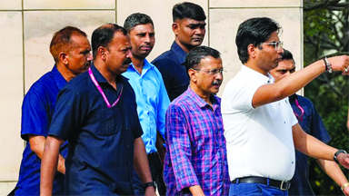 Delhi Chief Minister and AAP convenor Arvind Kejriwal comes out of the Rouse Avenue Court after he was produced by the Enforcement Directorate in the excise policy-linked money laundering case. (Source: PTI)